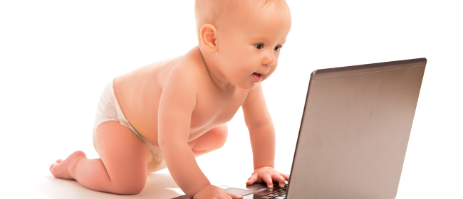 Baby And A Laptop Computer Isolated